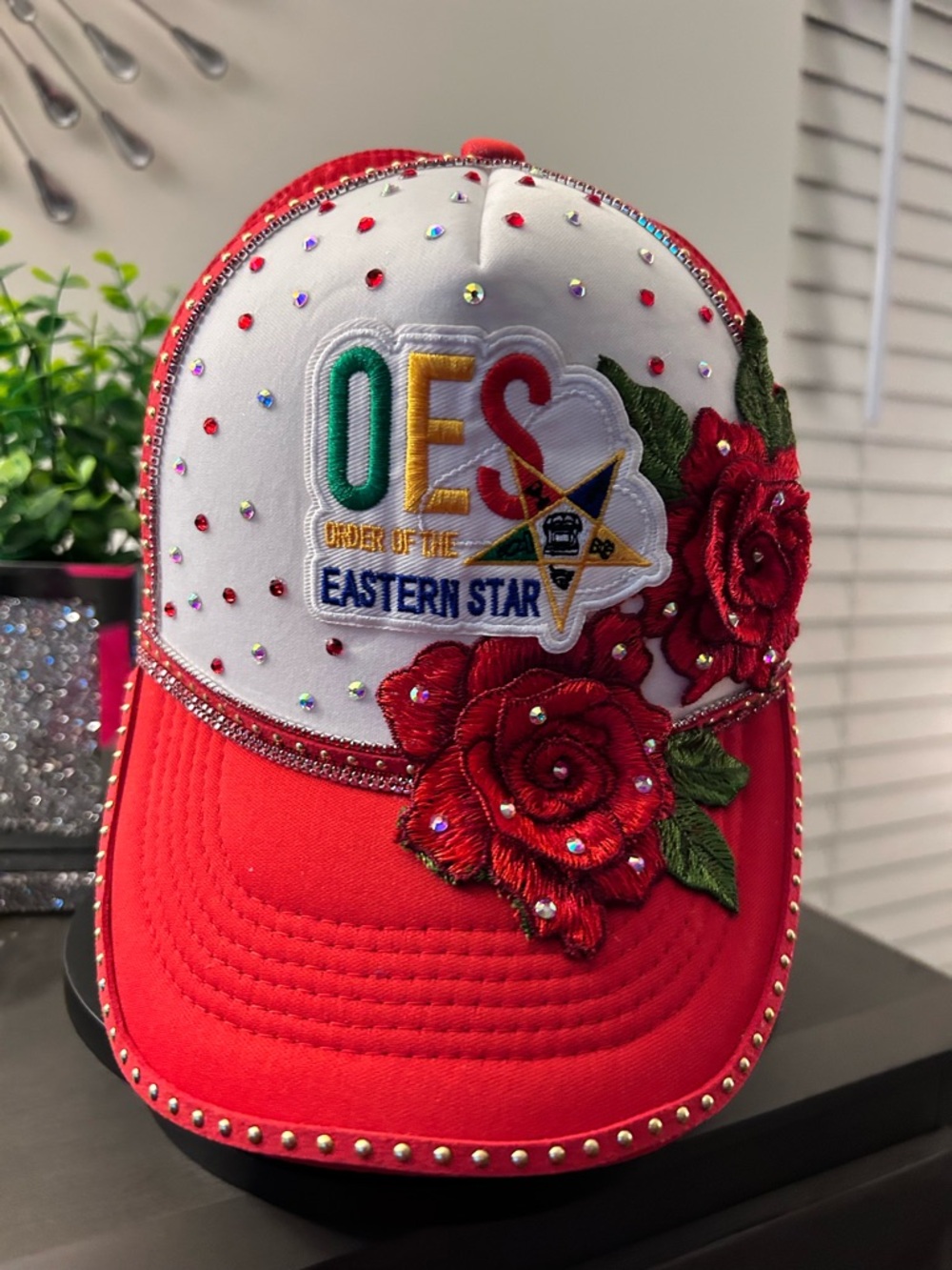 OES Caps with Rhinestones, trim and flower appliqués. $40.00 each.